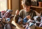 My son sewed 20 teddy bears from his late dad’s shirts for charity. At dawn, 4 deputies showed up—but they didn’t come to arrest him. What they pulled out of their cruiser left me in tears.